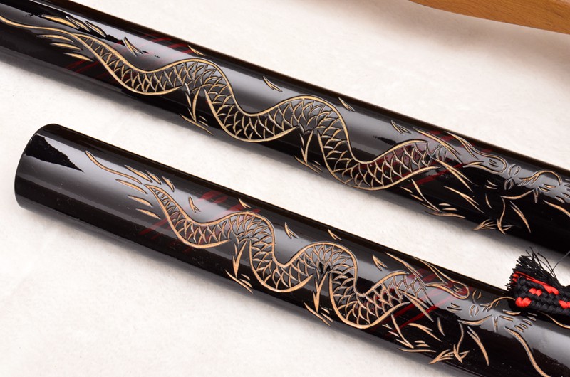 Handmade custom katana with engraved saya scabbard from HanBon Forge Handmade custom katana with engraved saya scabbard from HanBon Forge